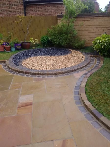 Sandstone Patio Installation in Hayden
